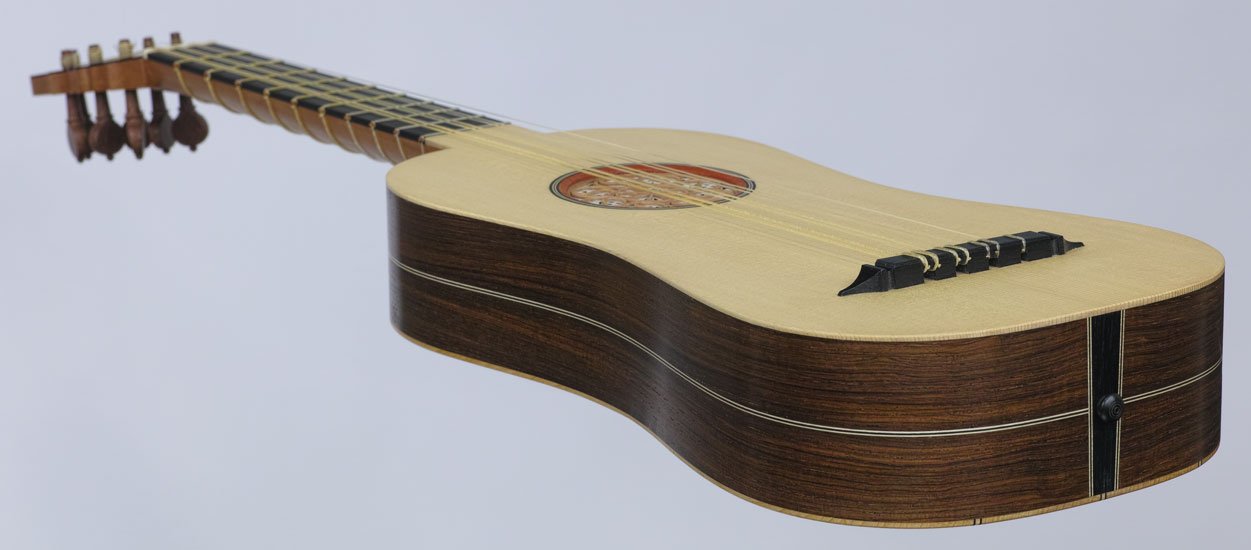 4-course flat-back Renaissance guitar end view in perspective