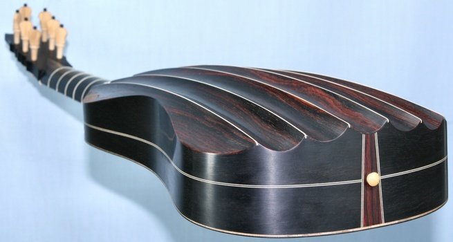4-course fluted back guitar end view in perspective