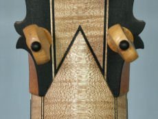 Stradivari guitar peghead, close-up view of v-join