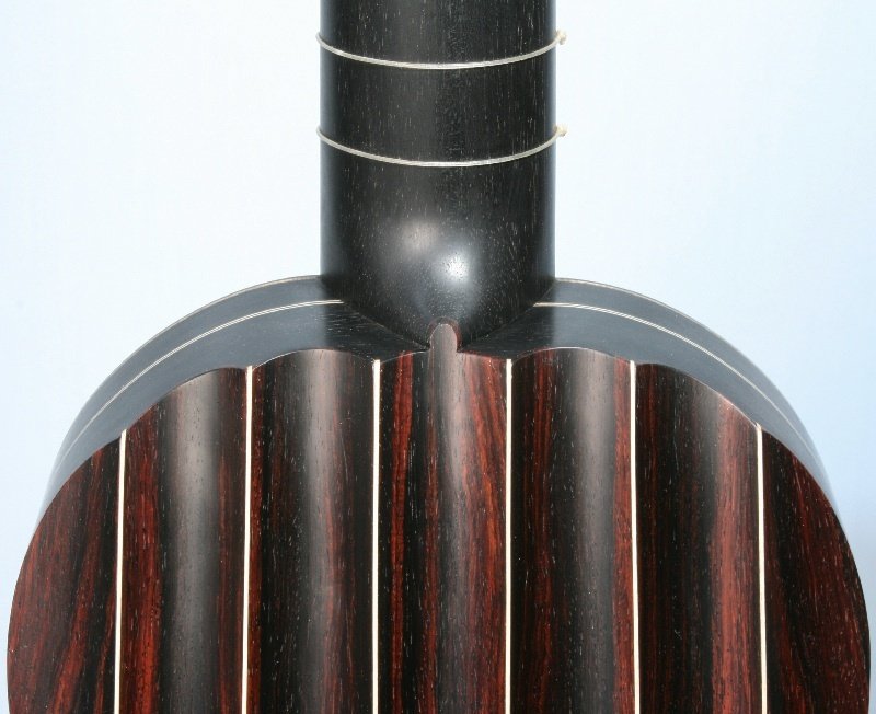 4-course fluted back guitar detail of body to neck join 